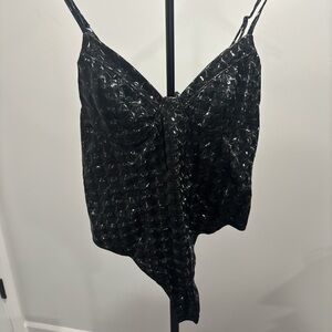 AKIRA Black shiny corset bodysuit. Perfect for layering for a night out.